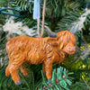 Highland Cow Ornament - Two Styles hanging on a Christmas tree available at Quilted Cabin Home Decor.