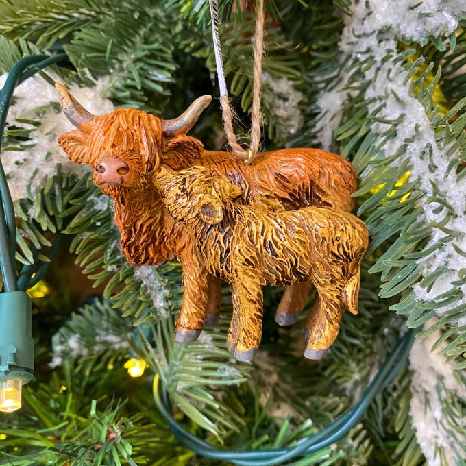 Highland Cow Ornament - Two Styles hanging on a Christmas tree available at Quilted Cabin Home Decor.