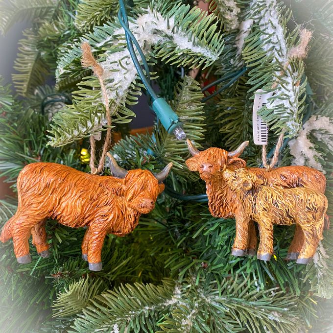 Highland Cow Ornament - Two Styles hanging on a Christmas tree available at Quilted Cabin Home Decor.