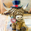 Christmas Highland Cow Figurines - Two Styles are ready for Christmas with their hats - one with a top hat and the other a red Santa Hat. Available at Quilted Cabin Home Decor.