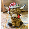 Christmas Highland Cow Figurines - Two Styles are ready for Christmas with their hats - one with a top hat and the other a red Santa Hat. Available at Quilted Cabin Home Decor.