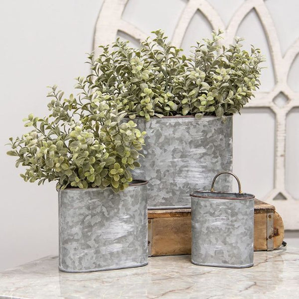Oval Galvanized Wall Planters - Three Sizes available at Quilted Cabin Home Decor.