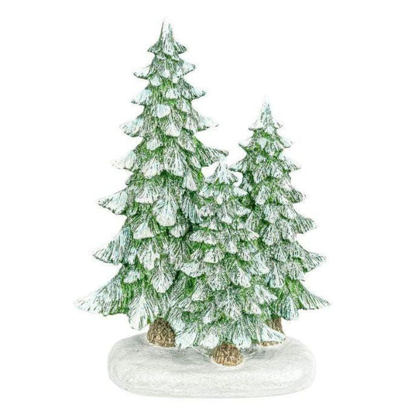 A decorative miniature winter forest scene featuring three frosted green pine trees with brown trunks standing on a white faux-snow base, isolated on a white background. Available at Quilted Cabin in Airdrie
