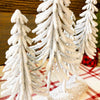 The Snowy Pine Forest on a Log is four very snowy looking trees on a half log. Available at Quilted Cabin Home Decor.