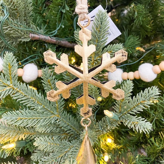 Decorative gold snowflake ornament on a Christmas tree with lights and beads. Vintage Gold Snowflake Ornaments - Set of Three available at Quilted Cabin  Home Decor.