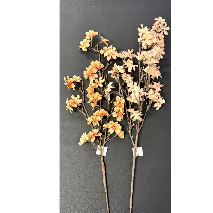 Two artificial flowering branches with peach, orange, and cream blossoms on brown stems, displayed against a dark gray background.  Available on line at quilted cabin or at Rustic Ranch furniture in Airdrie