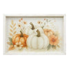 A rectangular framed wall art piece featuring a watercolor-style autumn harvest scene with white pumpkins, orange pumpkins, flowers, and leaves on a soft cream background.   Available at Quilted Cabin in Airdrie