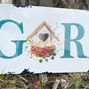 Garden Birdhouse Metal Sign available at Quilted Cabin Home Decor.