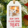 White wooden tree ornaments for dog owners with a space for a photo of your dog. The lettering is red. Available at Quilted Cabin Home Decor.