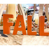 Orange wooden letters that spell FALL are available at Quilted Cabin Home Decor.