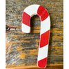 Wooden candy cane ornament available at Quilted Cabin Home Decor.