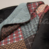 Appalachia Plaid Throw is available at Quilted Cabin Home Decor.