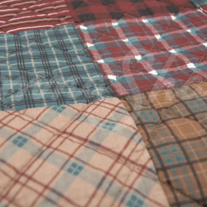 Appalachia Plaid Throw is available at Quilted Cabin Home Decor.