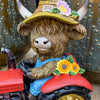 Highland Cow Tractor Figurine available at Quilted Cabin Home Decor.