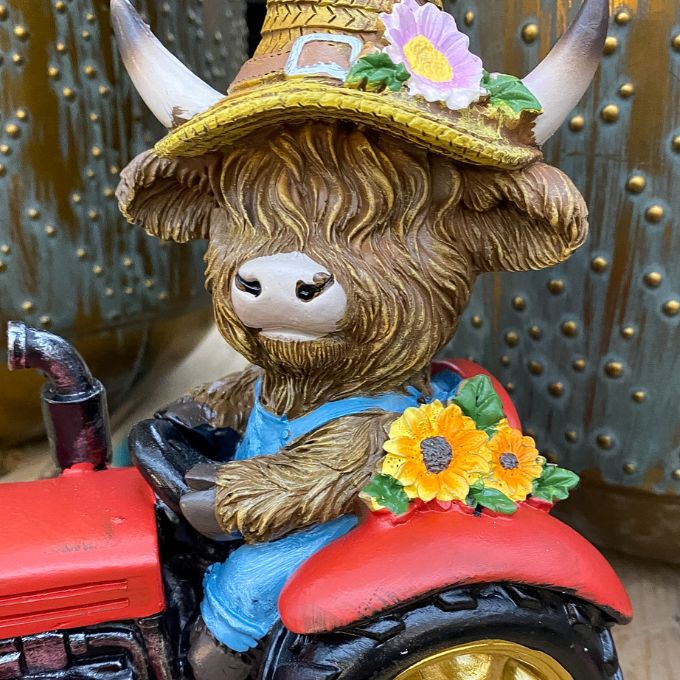 Highland Cow Tractor Figurine available at Quilted Cabin Home Decor.