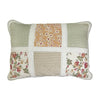Patchwork pillow with floral, striped, and checkered patterns on a white background. Peach Rose Quilt Set available at Quilted Cabin Home Decor.