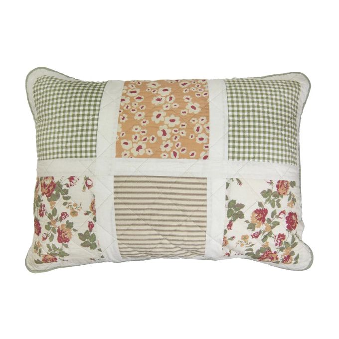 Patchwork pillow with floral, striped, and checkered patterns on a white background. Peach Rose Quilt Set available at Quilted Cabin Home Decor.