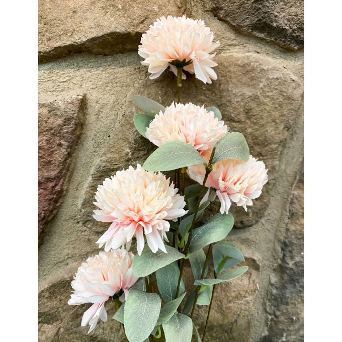 Pink Artificial flowers arranged against a stone wall. Amaranth Floral Stems - Three Colours available at Quilted Cabin Home Decor.