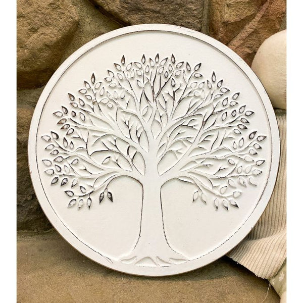 Decorative round wall art with tree of life design. Whitewashed Tree of Life Wall Art available at Quilted Cabin Home Decor.
