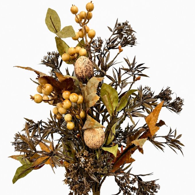 Dried autumn foliage arrangement featuring clusters of small golden-yellow berries, brown and tan leaves, and dark spiky stems on a plain white background.  Available at Quilted Cabin in Airdrie