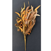 A dried autumn floral arrangement featuring golden-brown leaves, small orange berries, pinecones, and wheat-like stems, photographed against a dark charcoal background.  Available at Quilted Cabin in Airdire