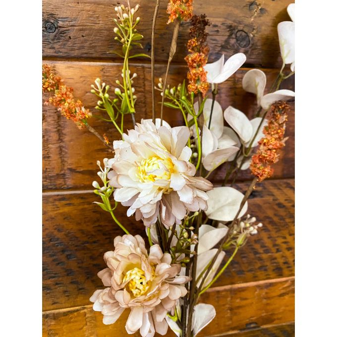 Artificial flowers with white and beige blooms on a wooden background. Brown and Tan Flower and White Eucalyptus Spray available at Quilted Cabin Home Decor.
