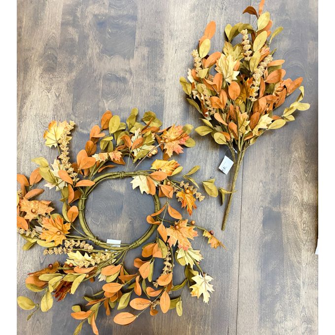 Autumn-themed wreath and floral arrangement on a wooden surface. Maple Leaf and Walking Fern Floral Spray available at Quilted Cabin Home Decor.