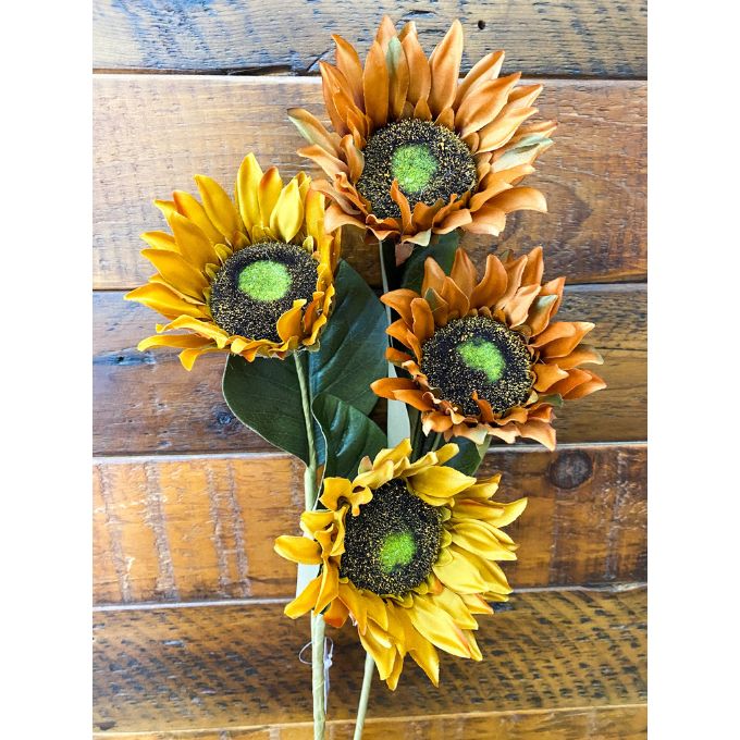 Bouquet of sunflowers on a wooden background. Sunflower Sprays - Two Colours available at Quilted Cabin Home Decor.