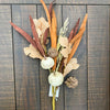 Decorative arrangement with pumpkins, leaves, and flowers on a wooden background. Pumpkin and Oak Leaf Candle Ring and Floral Spray available at Quilted Cabin Home Decor.