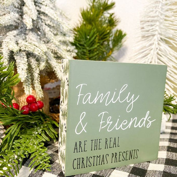 Friends and Family Are The Real Presents Block Sign available at Quilted Cabin Home Decor.