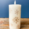 Golden Snowflake Pillar Candles - Three Sizes available at Quilted Cabin Home Decor.