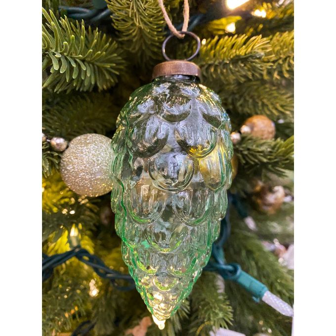 Decorative glass ornament shaped like a pine cone on a Christmas tree. Vintage Green Glass Ornaments - Three Styles available at Quilted Cabin Home Decor.