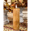 A cinnamon coloured votive candle available at Quilted Cabin Home Decor.