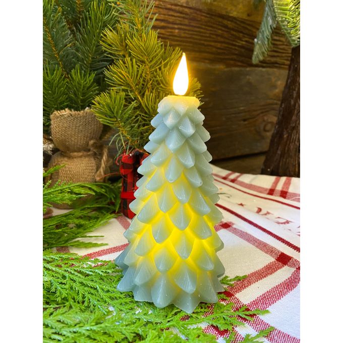 Two green christmas tree shaped candles available at Quilted Cabin Home Decor.