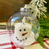 Two sizes of a snowman LED Candle in a clear plastic ornament. Available at Quilted Cabin Home Decor.