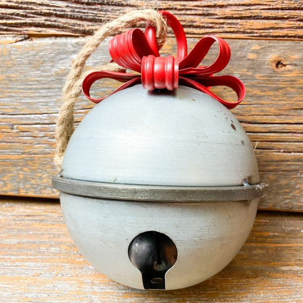 Tin Christmas Bell with Red Ribbon available at Quilted Cabin Home Decor