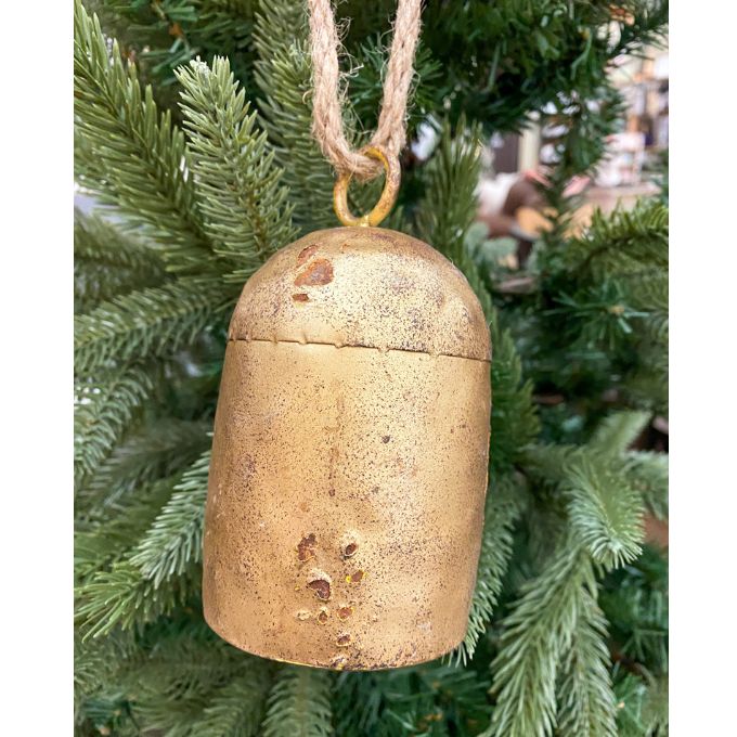 Vintage Gold Oval Cow Bell hanging from a jute cord. Available at Quilted Cabin Home Decor.