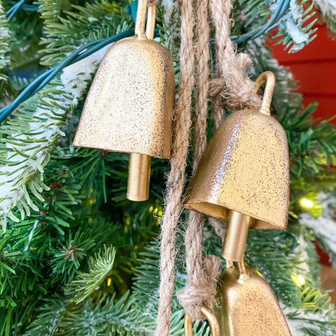 Vintage Gold Mini Cow Bell Hanger is 5 small gold bells on a jute hanger and available at Quilted Cabin Home Decor.