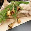 Vintage Gold Mini Cow Bell Hanger is 5 small gold bells on a jute hanger and available at Quilted Cabin Home Decor.