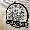 Welcome Wildflower Metal Hanger available at Quilted Cabin Home Decor.