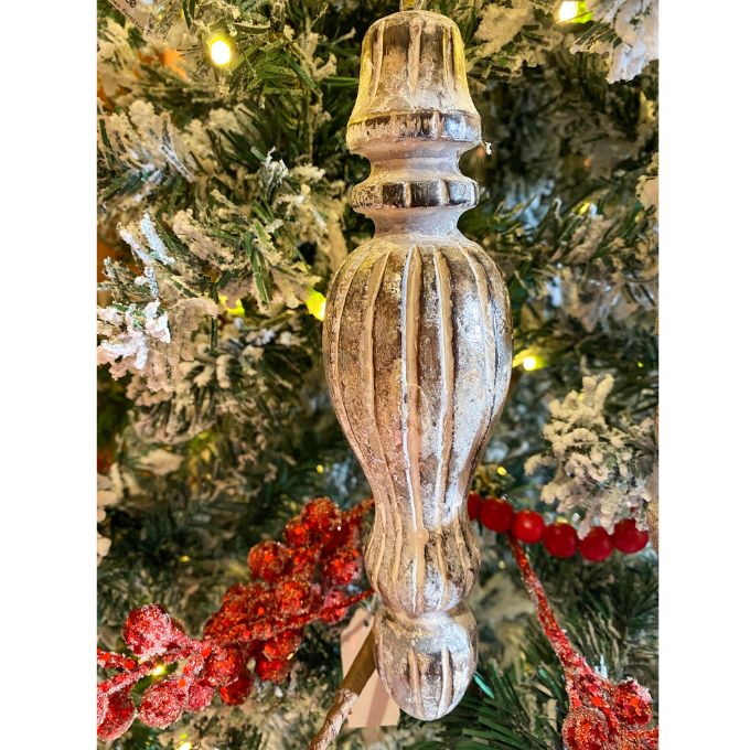 Decorative finial ornament on a Christmas tree with red berries. Mango Wood Finial Ornaments  - Three Styles available at Quilted Cabin Home Decor.