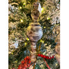 Decorative finial on a Christmas tree with lights and ornaments. Mango Wood Finial Ornaments  - Three Styles available at Quilted Cabin Home Decor.