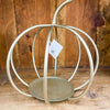 Decorative gold metal pumpkin candle holder. The Gold Pumpkin Lantern available at Quilted Cabin Home Decor. 