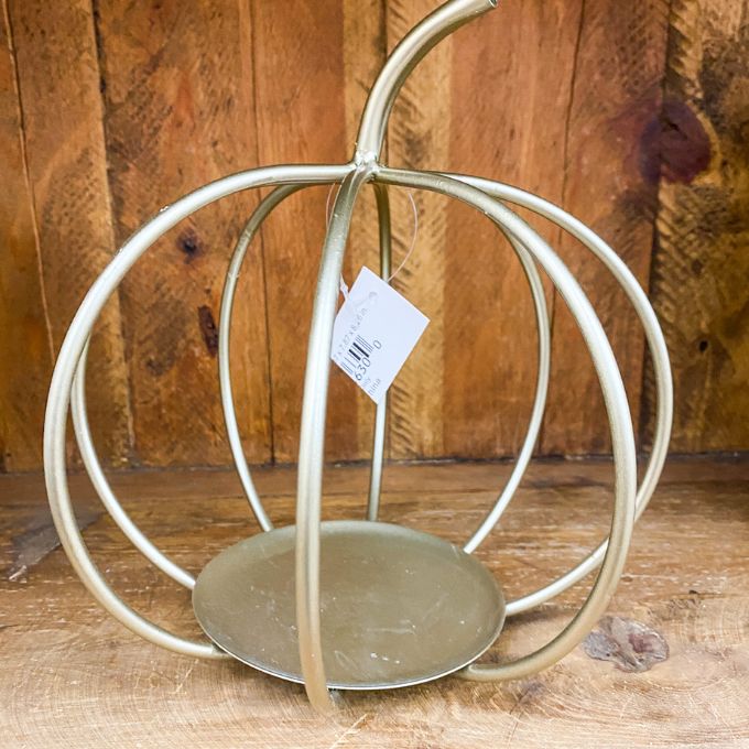 Decorative gold metal pumpkin candle holder. The Gold Pumpkin Lantern available at Quilted Cabin Home Decor. 