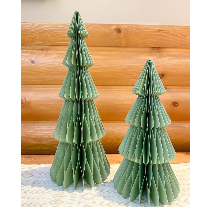 Two green paper Christmas trees on a wooden surface. Vintage Green Paper Trees - Two Sizes available at Quilted Cabin Home Decor.