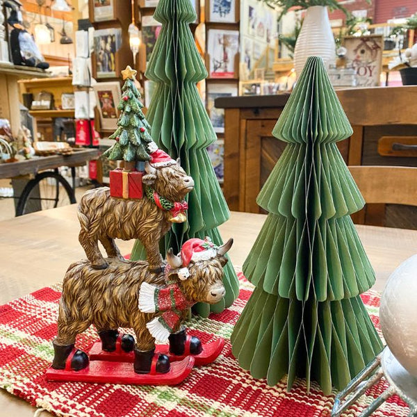 Decorative Christmas scene with paper trees and animal figurines on a table. Vintage Green Paper Trees - Two Sizes available at Quilted Cabin Home Decor.