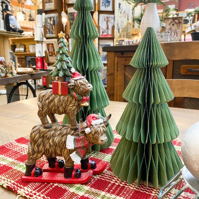 Decorative Christmas scene with paper trees and animal figurines on a table. Vintage Green Paper Trees - Two Sizes available at Quilted Cabin Home Decor.