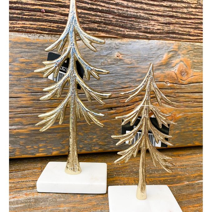 Two gold trees of different heights on white bases available at Quilted Cabin Home Decor.