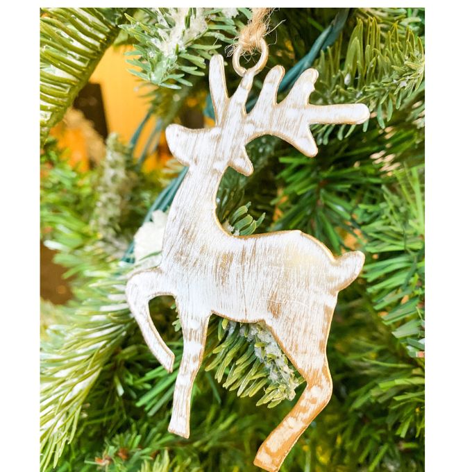 White washed gold deer ornaments in two styles - one is standing and one is flying. Available at Quilted Cabin Home Decor.