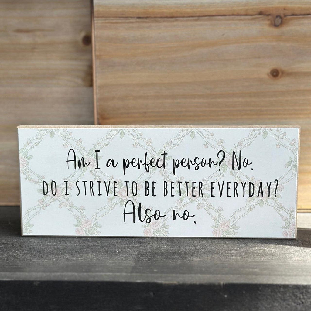 Decorative sign with motivational quote on a wooden surface available at Rustic Ranch Furniture in Airdrie